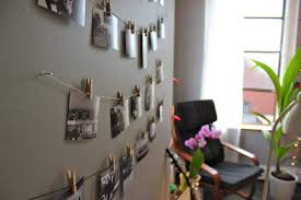 We love the way they printed their photos in black and white and hung them from the mesh using miniature crafting clothespins. 10 Creative Ways To Hang Photos Without Frames