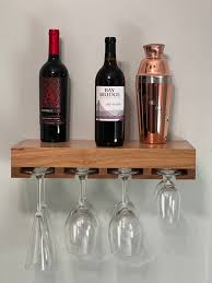 Stained Oak Floating Shelf With Wine