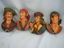 set of 4 pirate head wall hanging