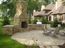Backyard Stone Corner Fireplace With