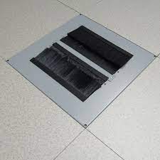 raised floor tile with brush strip