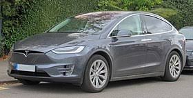 The driver's door opens on approach if you've got your key in your hand, which is a nice touch, and all the other doors open with the (model car) key, or you can open and close all doors with the touchscreen. Tesla Model X Wikipedia