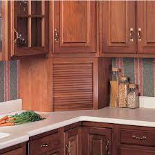 Walzcraft's corner unit appliance garage (order model #agc) is sold as a complete kit with a solid wood tambour door made of either alder, cherry, hickory, hard maple or red oak.the end and side panel material is made of 3/8″ ply with an mdf core and a plain sliced veneer face. Appliance Garages Tambour Corner Wood Kitchen Appliance Garage By Omega National Kitchensource Com
