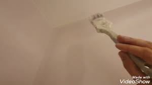 wall meets ceiling over bad plaster
