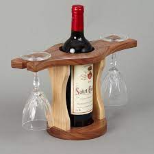 The holes for the shot glasses were also formed with the router. Wine Bottle Glass Holder Beveledge Wine Bottle Glass Holder Wooden Wine Glasses Wine Glass Holder