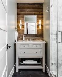 rustic bathroom with plank accent wall