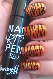 tiger nails using barry m nail art pens