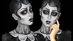 greyscale caricature body painting