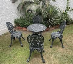 Cast Iron Table And Chairs In