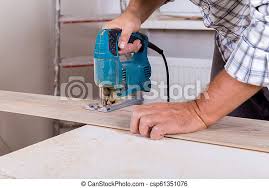 The speed of the power tool must be high. Installing Laminate Flooring Carpenter Cut Parquet Floor Board With Electric Jigsaw Canstock
