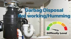 garbage disposal not working humming