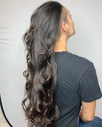 Here her hairstyle is very simple and easy to achieve for women with thinner hair. 14 Edgy Long Hair With Shaved Sides Back Undercuts For Women