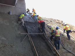 pour concrete on slope effectively