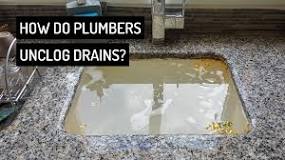 What do plumbers use to clean drains?