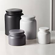 The lids come with rubber gaskets to help keep air out, and the hand hammering gives it a unique look. Modern Kitchen Canisters Cb2