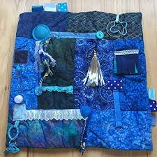 Pretty, but a bit advanced for a beginner, but you could still do it if you go slow and patiently! Amazon Com Alzheimer S Fidget Blanket 23 X23 Fidget Quilt Alzheimer S Blanket Beautiful Blue Dreamer By Restless Remedy Handmade