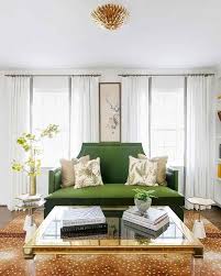 emerald green sofa with gold coffee