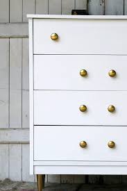 Painted White With Gold Metallic Knobs