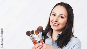 a female makeup artist with a set of