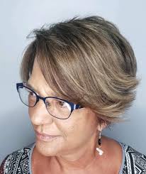 Put your hair in a sleek, low ponytail if you want a simple but chic look. 17 Best Short Hairstyles For Women Over 50 With Glasses