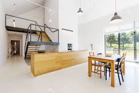 There was a problem fetching the translation. Mezzanine Floor In Minimalist Spacious Apartment With Wooden Stock Photo Picture And Royalty Free Image Image 79755677