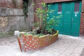 Raised garden beds made of bricks or cement blocks if wood and braid are not durable enough or are too complicated to build yourself leftover blocks or bricks can also be used for this purpose. 15 Creative Ways To Use Bricks In Garden Design Gardener S Path