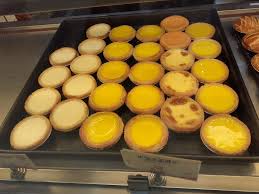 I'm sure you've been eating eggs every day for breakfast though (aren't we all?) so what else can we make with lots of eggs? Egg Tart Wikipedia