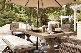 At the end of the year, be sure to protect your new outdoor dining chairs with weatherproof outdoor furniture covers. Beachcroft Outdoor Dining Table With Umbrella Option Ashley Furniture Homestore