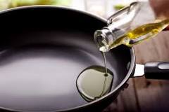 Does olive oil damage non-stick pans?