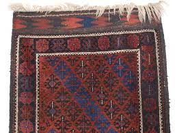 antique baluch rug lattice design