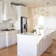 white kitchen remodel with gold accents