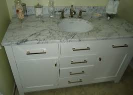 bathroom vanity cabinet including sink