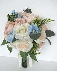 Check spelling or type a new query. Wedding Bouquet 17 Piece Bridal Bouquet Package Peach Blush Etsy In 2020 Champagne And Blue Wedding Blue Wedding Bouquet Blue Wedding Flowers