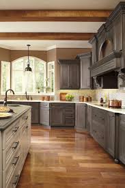 Want to give your kitchen a modern makeover? Stained Gray Brown Cabinets Novocom Top