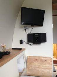 Wall Mounted Tv Dvd Player And A Mini