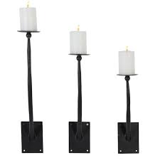 See what makes us the home decor candle holders in a rainbow of colors, styles and price points to suit your taste and budget. Tall Modern Black Metal Wall Sconce Pillar Candle Holders Set Of 3 16 19 22 4 X 9 X 22 Overstock 32141592