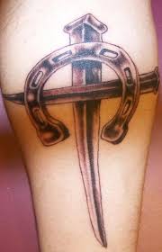 The horse shoe must have the open end in the upward direction so that the good luck is held inside for the bearer. Iron Cross And Horseshoe Tattoo Tattooimages Biz