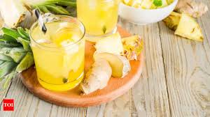 drinking pineapple and ginger juice