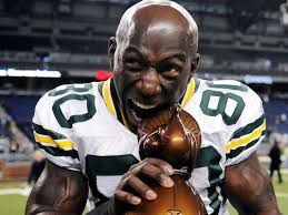Green Bay Packers wide receiver Donald Driver (80) celebrates after being awarded the Galloping Gobbler trophy after defeating the Detroit Lions 34-12 at ... - 1376584476000-USP-NFL-Green-Bay-Packers-at-Detroit-Lions