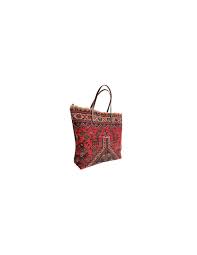 a large bag of iranian carpets at a