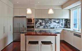 This quilted tile backsplash is the focus of this small neutral kitchen. Backsplash Ideas Houzz