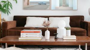Sophisticated small coffee tables such as this one could seriously upgrade the personality of a room. 15 Pretty Ways To Decorate And Style A Coffee Table