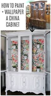 painted china cabinet with wallpaper