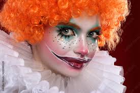 cute red haired clown in bright
