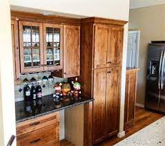 House 5748 was a former inventory home and did not get cabinets, faucets, sinks installed prior to pictures. The Cabinet Guy Llc Knotty Beech Refaced Kitchen