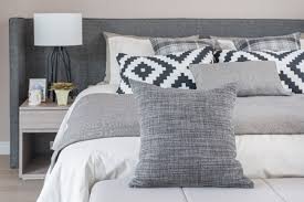arrange pillows on a bed for comfort