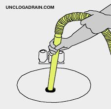 unclog a drain using a wet vacuum