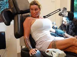 Katie Price pumps boobs out during tattoo session after being charged with  harassment - Irish Mirror Online