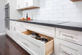 Kitchen drawers, especially deep ones, can be outfitted to hold a lot of food too…see our drawers in detail here! Pots Pans Drawer Storage Cabinet For Cookware