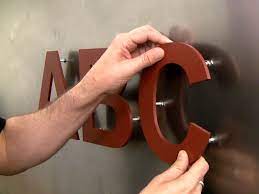Mount Sign Letters On A Metal Wall